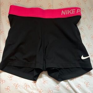 Nike Women’s Black Nike Pro Shorts with Bright Pink Waistband